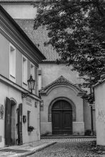 Pretty corner with church door in Prague