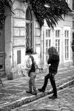 Young mother with son on street, Bretagne France