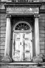 Stately but weathered door with pillars, Wassenaar