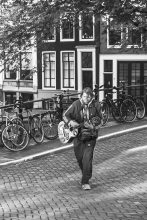 I am a guitarist, tramp on street Amsterdam
